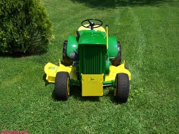 1967 (round-fender) John Deere model 112 with hydraulic lift.