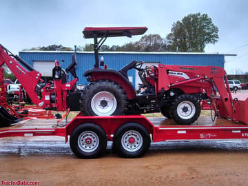 Mahindra 3810 with ML112 front-end loader and 509 backhoe, right side.