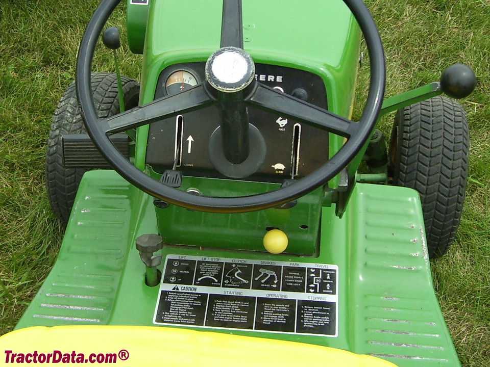 John Deere 140 operator station and controls.