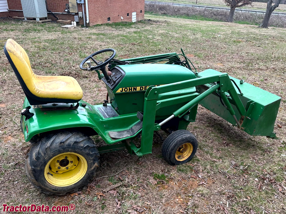 John Deere 314 with front-end loader.