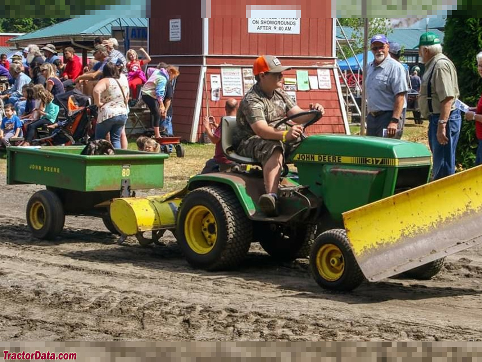 John Deere 317 with blade, tiller, and model 80 cart.