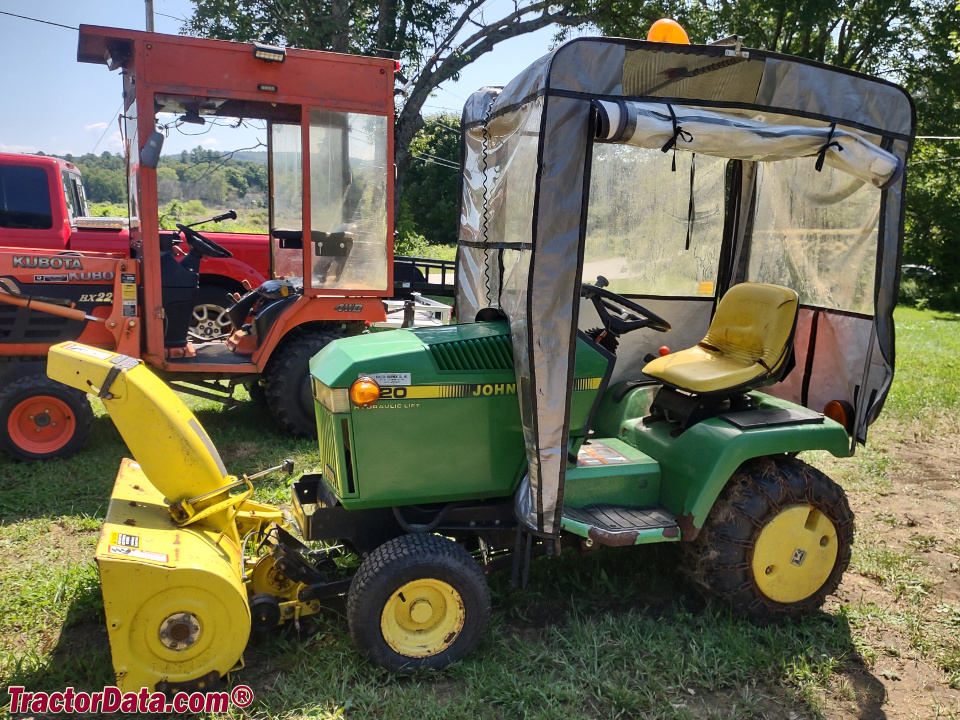 John Deere 320 with 49 snowblower and Bercomac softcab.