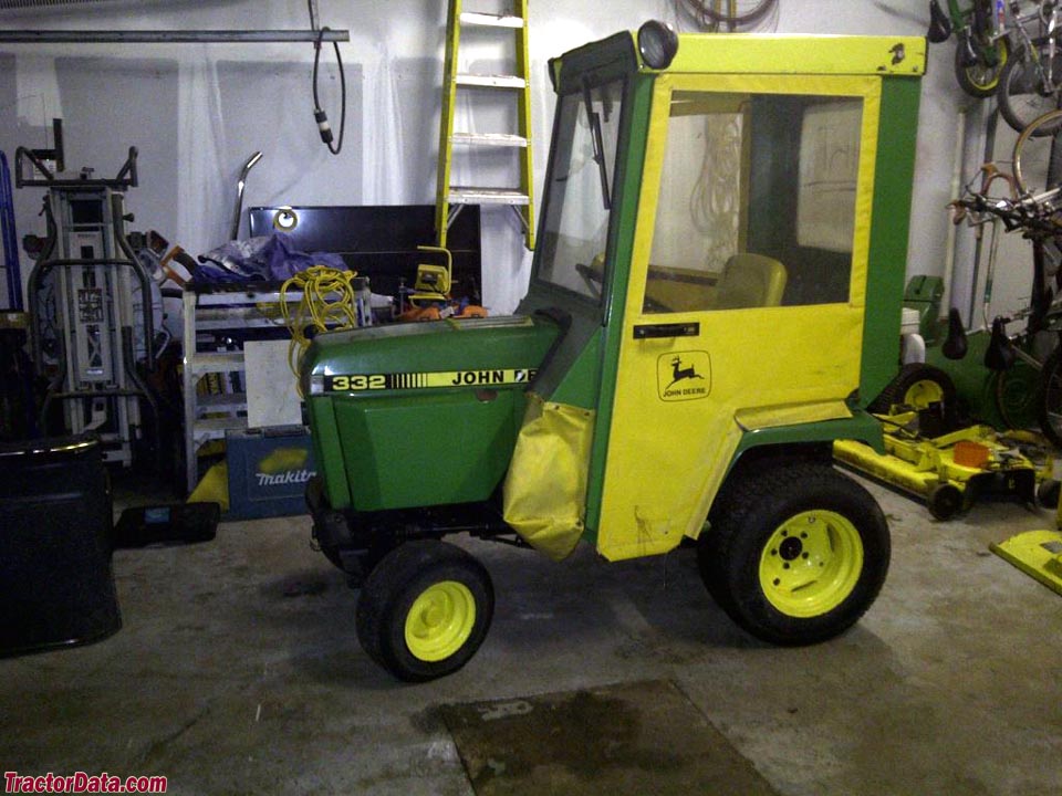 John Deere 332 with cab.
