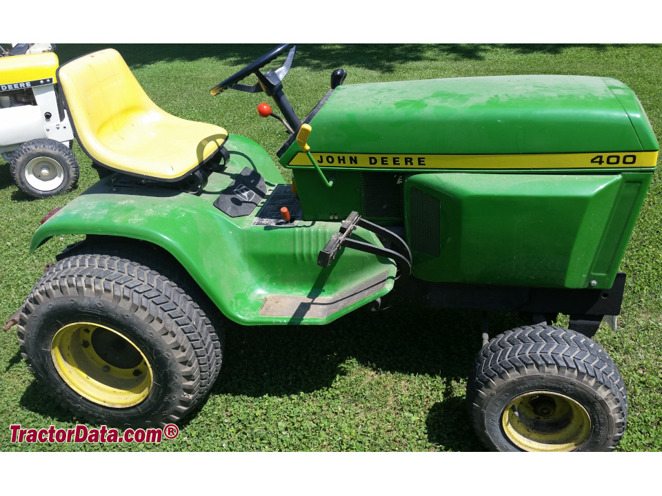John Deere 400 garden tractor with three-point hitch.