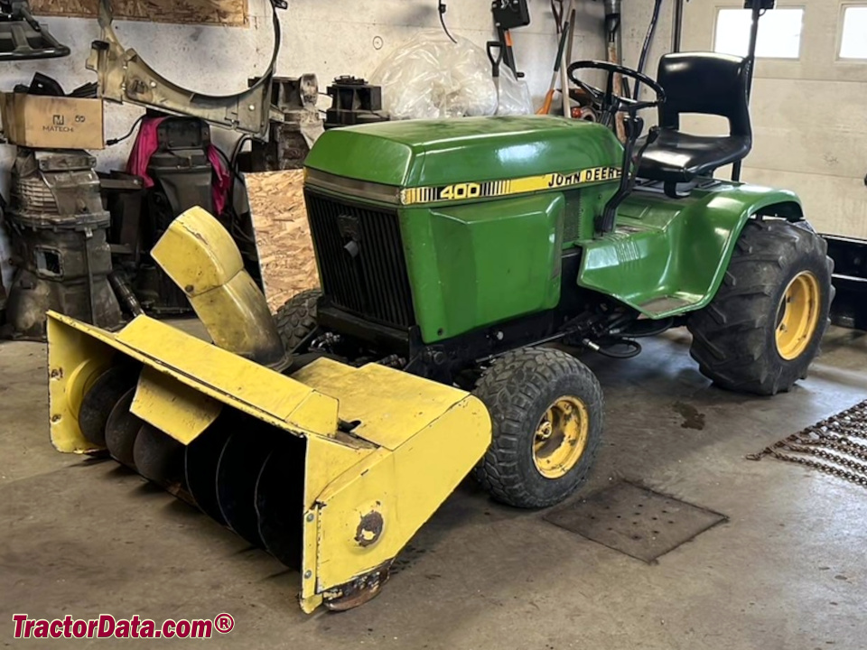 John Deere 400 with front-mount snow blower.