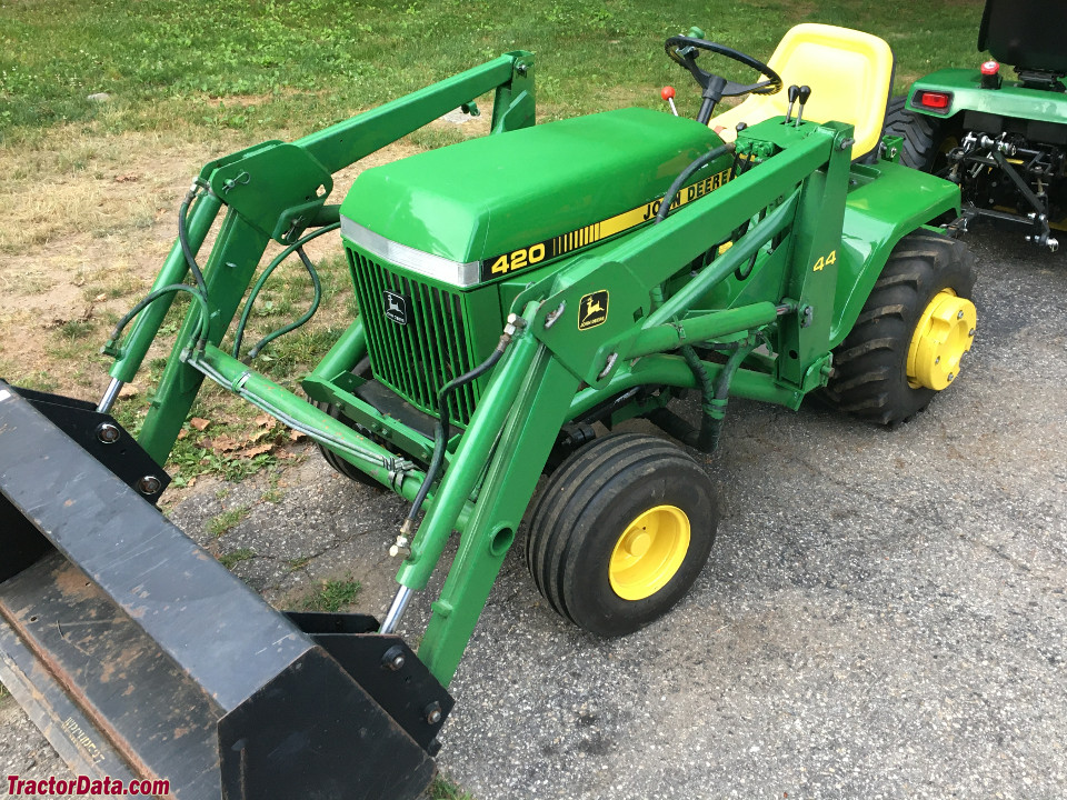 John Deere 420 with 44 front-end loader.