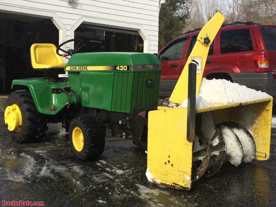 John Deere 430 with snow blower.