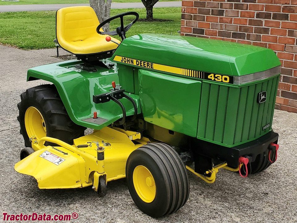 John Deere 430 with mower deck.