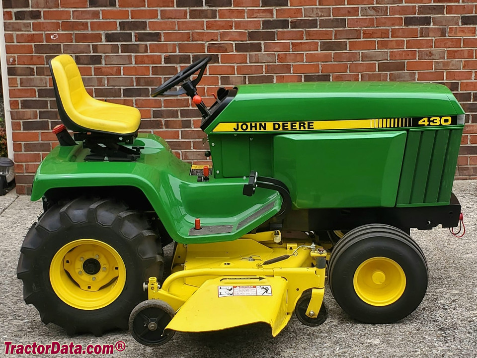 John Deere 430 with mower deck.