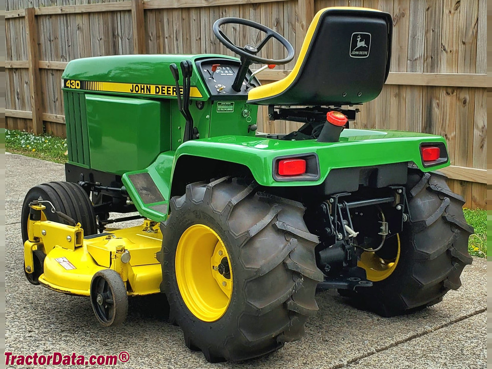 John Deere 430 with mower deck.