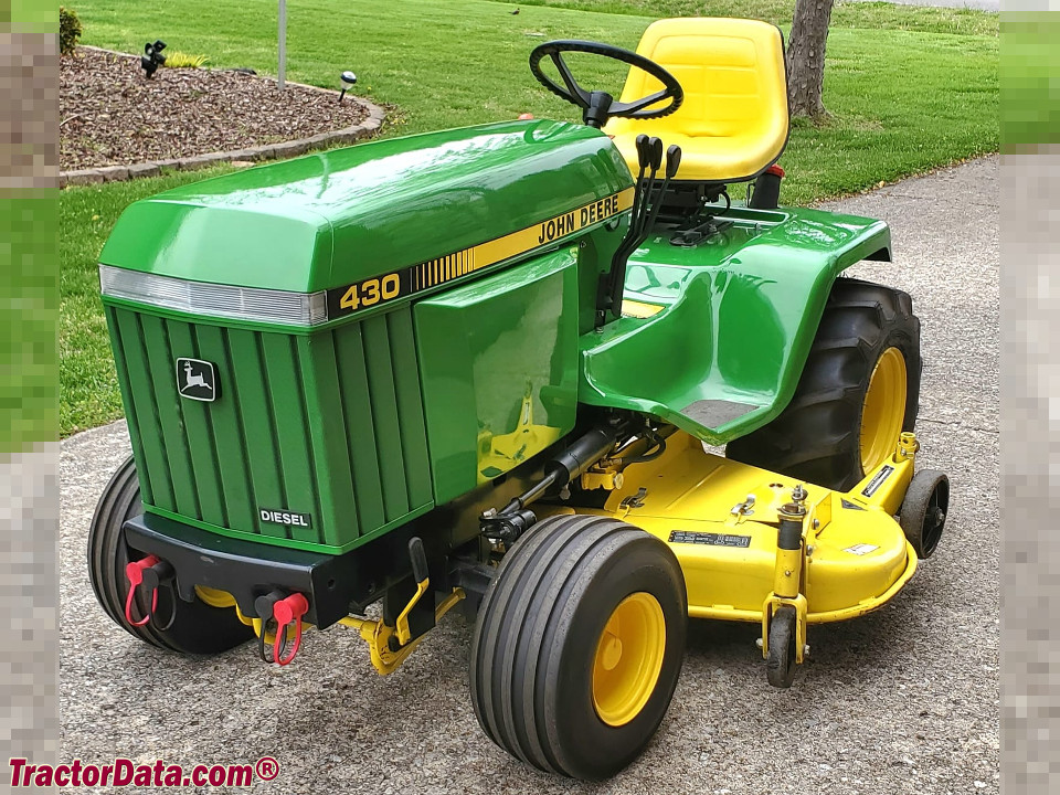 John Deere 430 with mower deck.