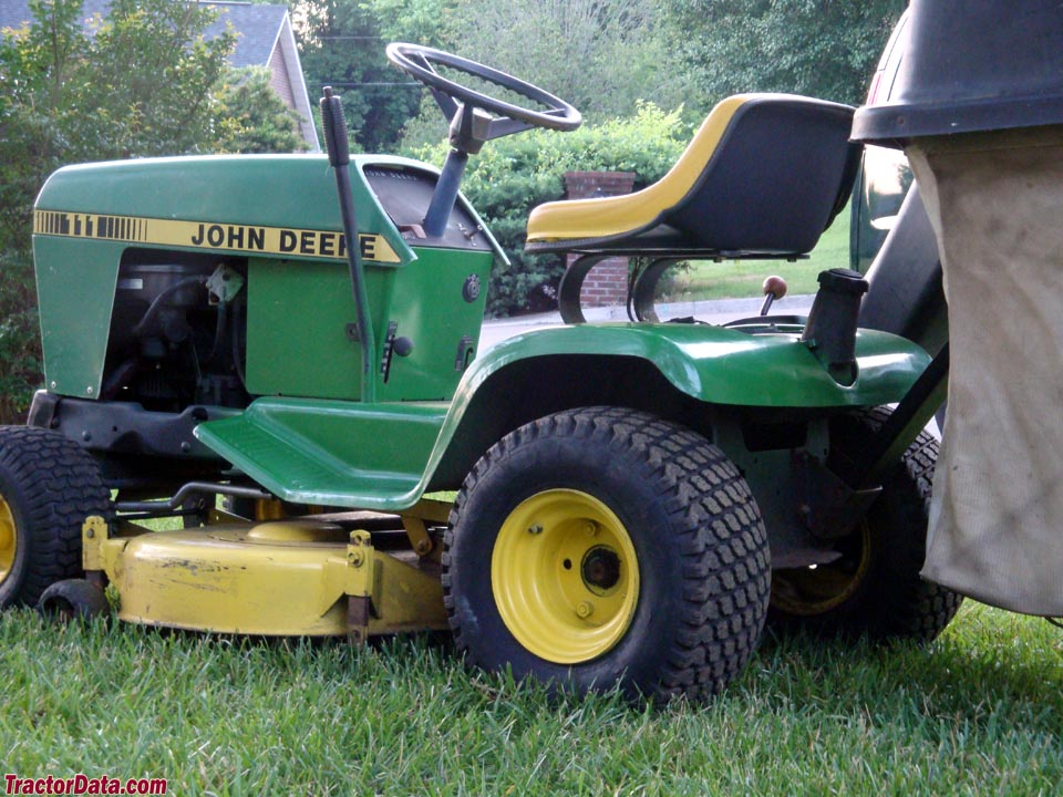John Deere 111H with mower and rear bagger.