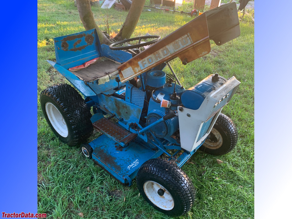 Ford 80 with hood open.