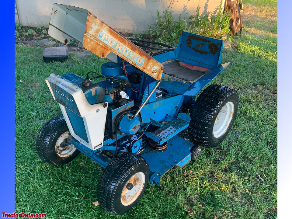 Ford 80 with hood open.