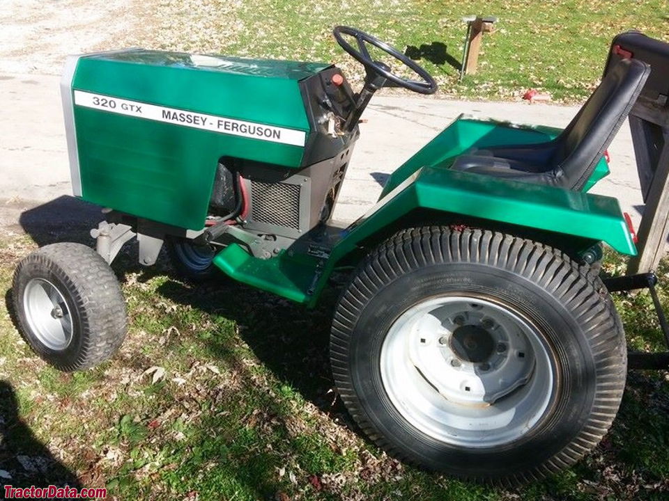 Massey Ferguson 320GTX garden tractor with custom paint and headlights.