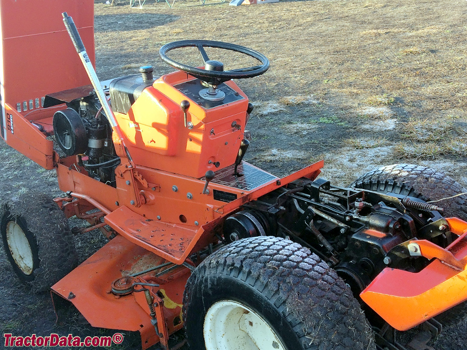 Allis-Chalmers 910 with hood and rear fender deck opened.