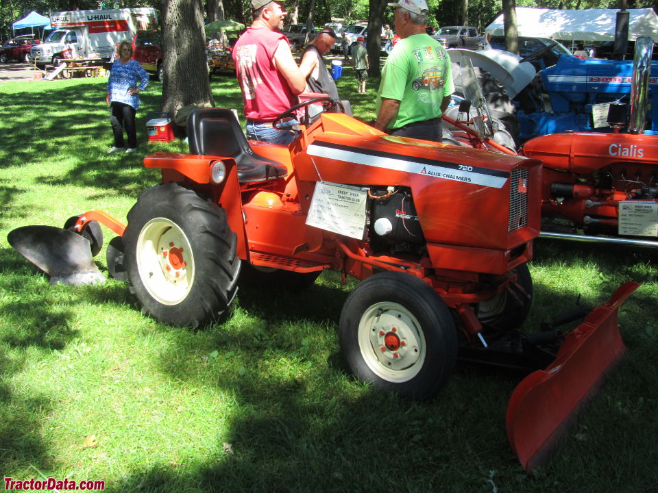 Allis-Chalmers 720 with plow and front blade.